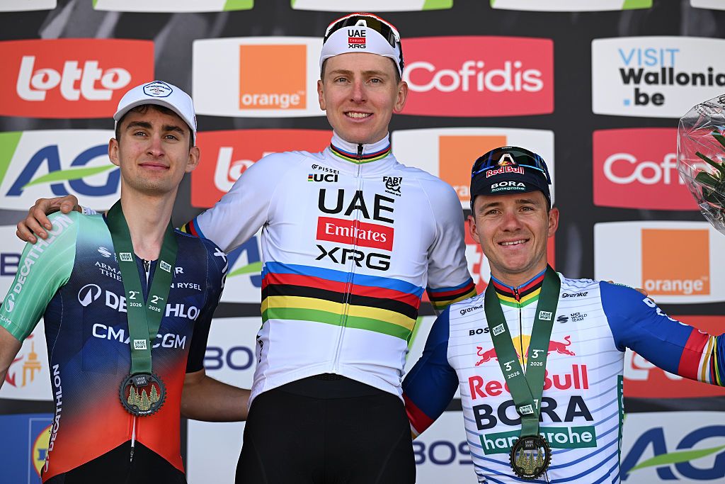 Winner Tadej Poga&amp;#269;ar, second place Paul Seixas and third place Remco Evenepoel on the podium at Li&amp;egrave;ge-Bastogne-Li&amp;egrave;ge
