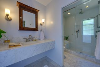 marble bathroom with white walls