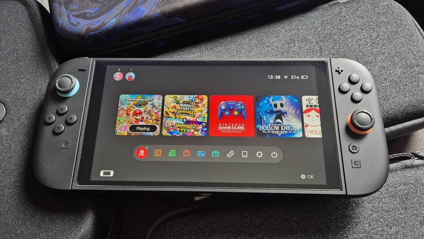 Photo by Rosalie Newcombe of the Switch 2 sitting on a pile of Switch 2 cases.