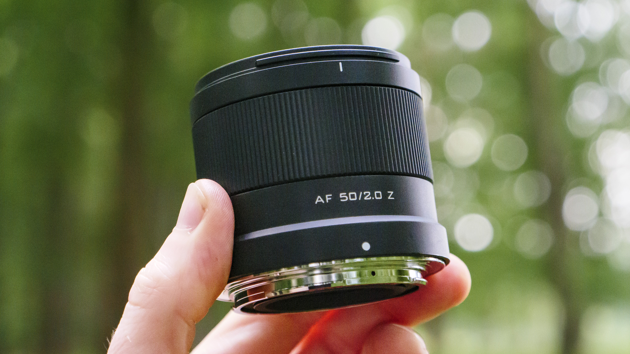 Viltrox AF 50mm F2 Air lens in the hand