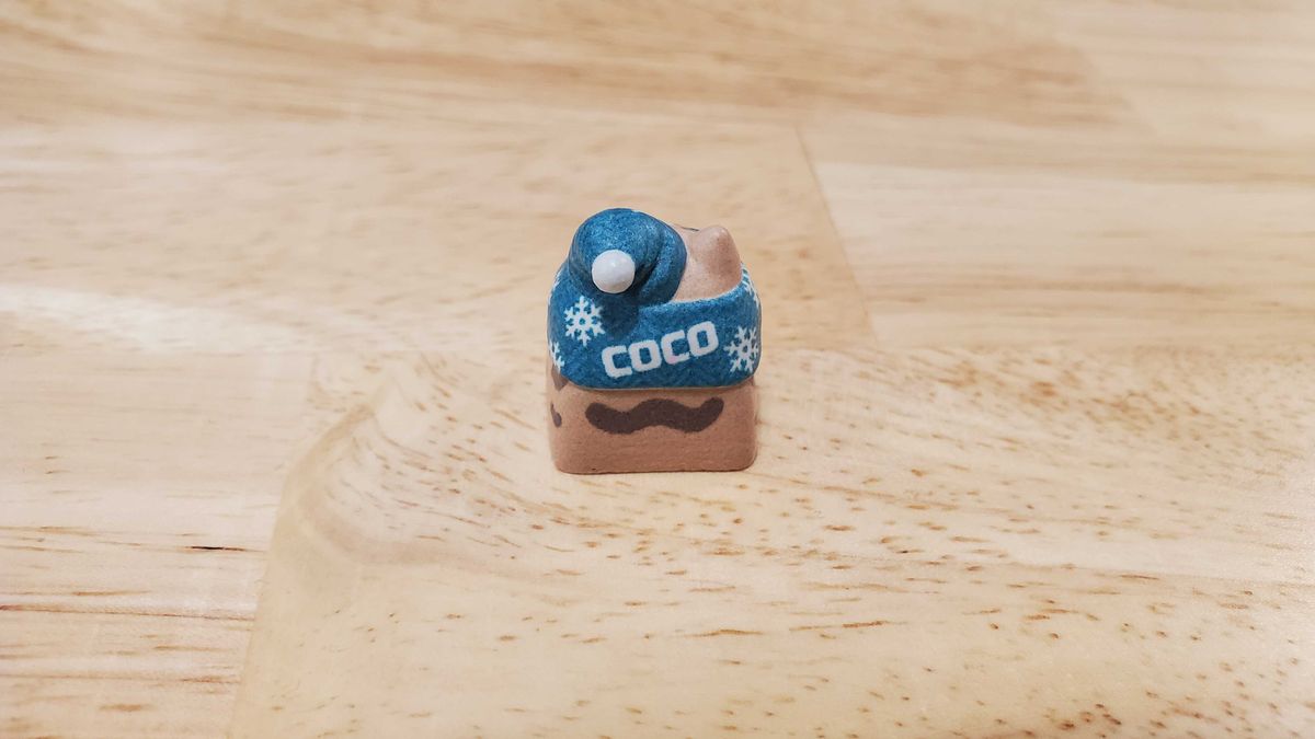 a small cat shaped keycap