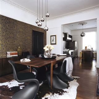 dining room with wooden floor and dining table