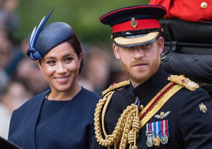 Prince Harry, Duke of Sussex and Meghan, Duchess of Sussex ride by carriage down the Mall during Trooping The Colour, the Queen&#039;s annual birthday parade, on June 08, 2019 in London, England.