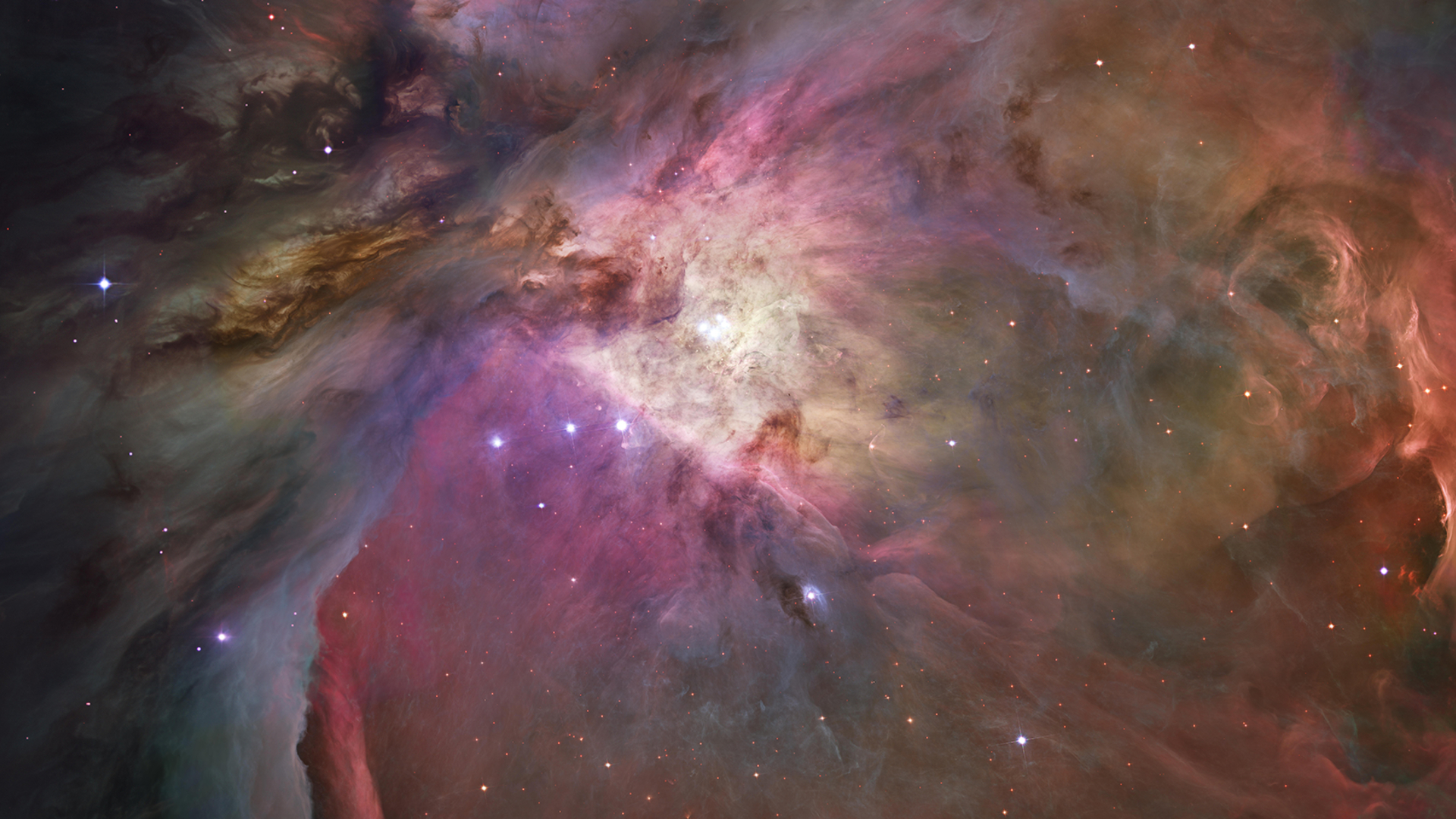 顯示了一個星雲的搖擺場景，上面有五顏六色的間雲層被近星星照亮，其中許多是可見的。
