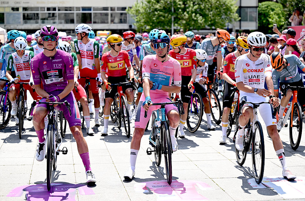 PLOVDIV, BULGARIA - MAY 10: (L-R) Paul Magnier of France and Team Soudal Quick-Step - Purple Points Jersey, Guillermo Thomas Silva of Uruguay and Team XDS Astana - Pink Leader Jersey and Jan Christen of Switzerland and UAE Team Emirates - XRG - White Best Young Rider Jersey prior to the 109th Giro d&amp;amp;apos;Italia 2026, Stage 3 a 175km stage from Plovdiv to Sofia / #UCIWT / on May 10, 2026 in Plovdiv, Bulgaria. (Photo by Dario Belingheri/Getty Images)