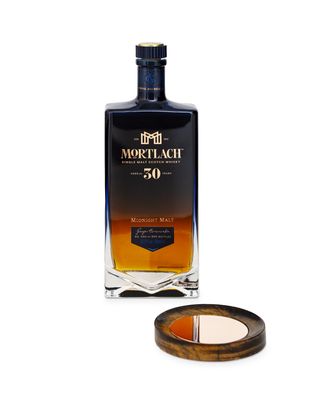 Mortlach 30 Year Old whisky and a coaster with a copper surface