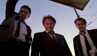 Reservoir Dogs cast stares into a car's trunk