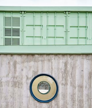 Green building round window at Educan School for Dogs, Humans and Other Species