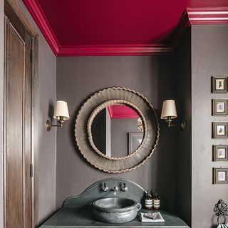 grey bathroom with red ceiling