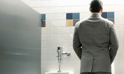 Man at urinal