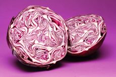 The purple cabbage in cross section reveals an intricate interweaving of patterns. Credit: Alamy