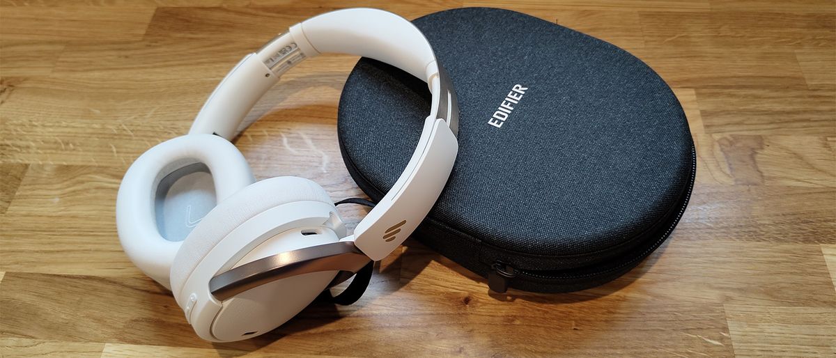 Edifier WH950NB review; cream coloured headphones on a grey case