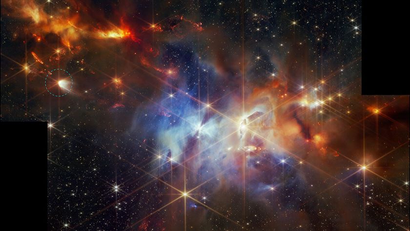 Glowing swirls of purple and orange gas mix with bright twinkly stars against a dark deep space background