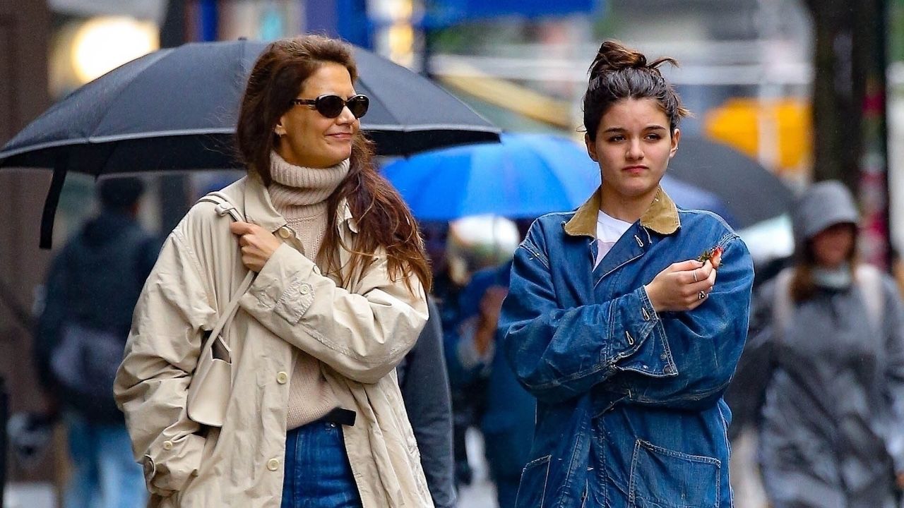 Katie Holmes and Suri Cruise in New York City May 2024 wearing rainy day outfits including baggy jeans