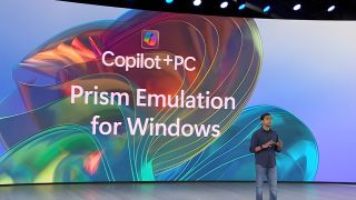 Pavan Davuluri speaking on stage about Prism emulation for Windows