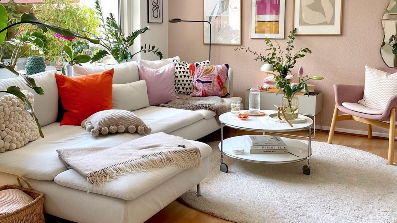 Living room with neutral couch and white coffee table