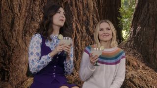 Screenshot of Janet and Eleanor drinking near a tree in The Good Place series finale.