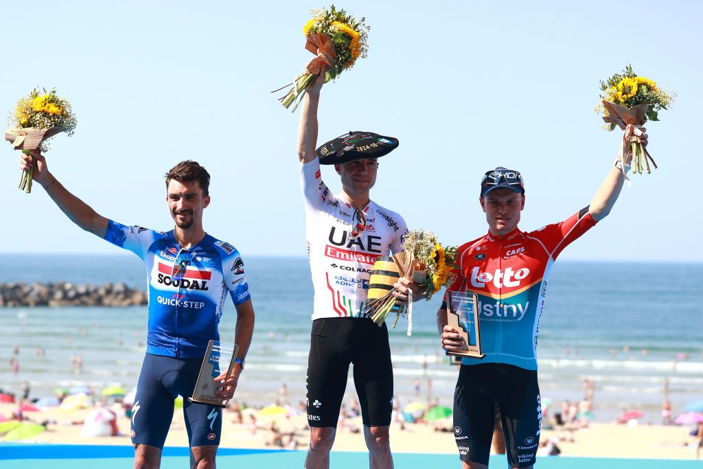 SAN SEBASTIAN SPAIN AUGUST 10 LR Julian Alaphilippe of France and Team Soudal QuickStep on second place race winner Marc Hirschi of Switzerland and UAE Team Emirates and Lennert Van Eetvelt of Belgium and Team Lotto Dstny on third place pose on the podium ceremony after the 44th Donostia San Sebastian Klasikoa 2024 a 236km one day race from San Sebastian to San Sebastian UCIWT on August 10 2024 in San Sebastian Spain Photo by Gonzalo Arroyo MorenoGetty Images