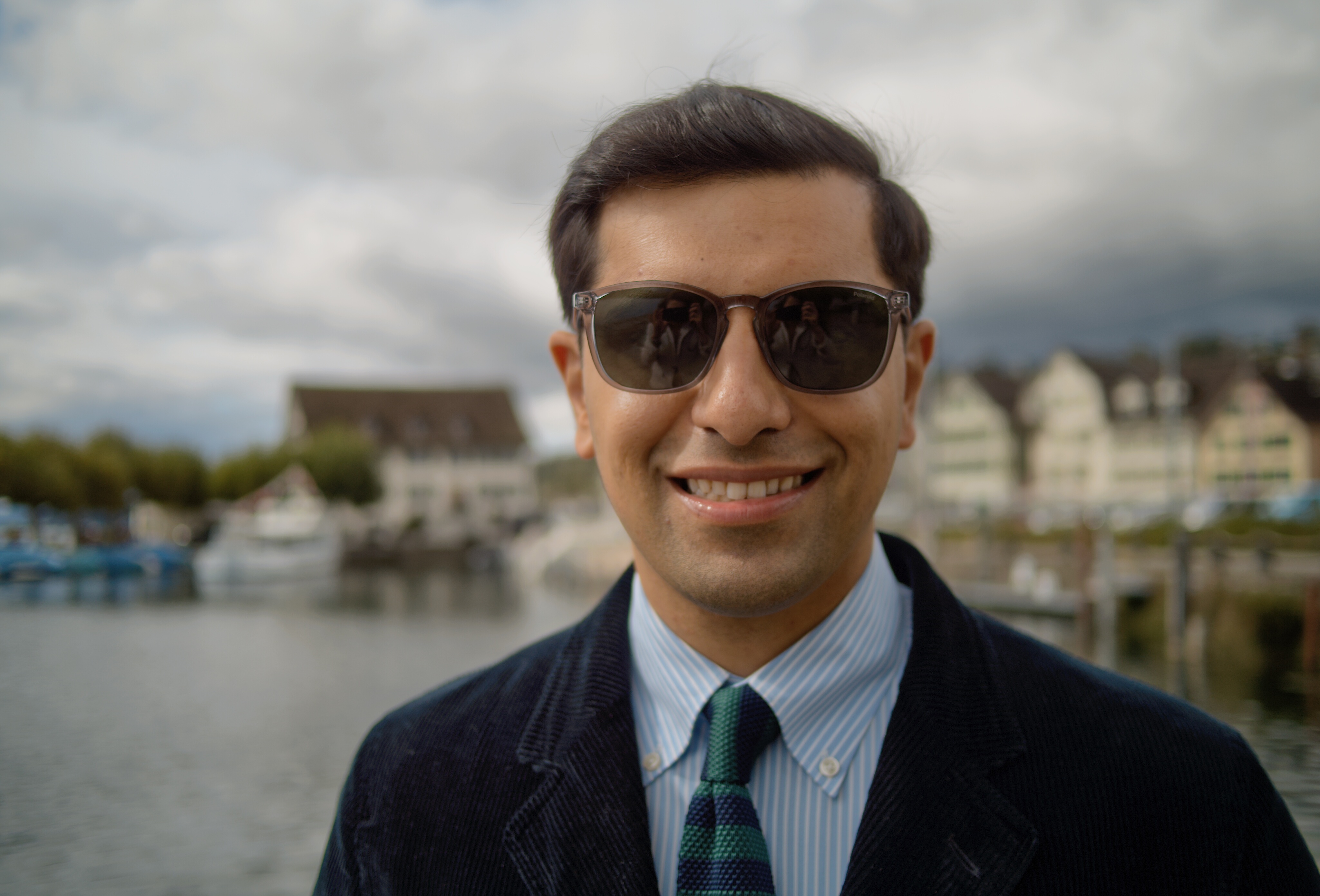 The Camera Intelligence Caira AI camera photo of a person in sunglasses before editing