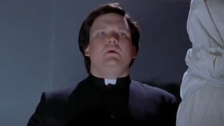 Andy Richter dressed as an exorcism priest in Scary Movie 2