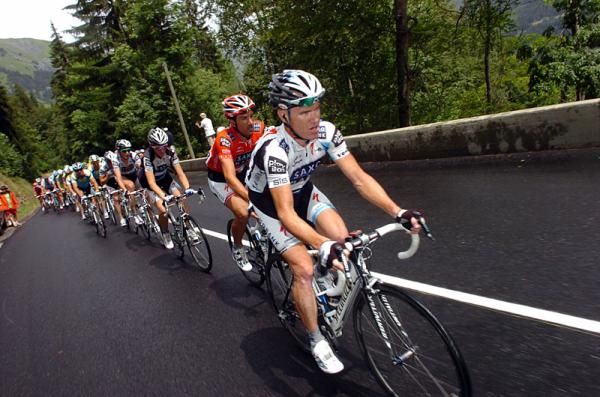 Saxo Bank teammates Stuart O'Grady and Fabian Cancellara set tempo on the Col des Saisies.