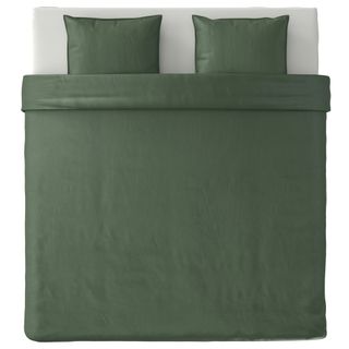 green colour pillows and duvet