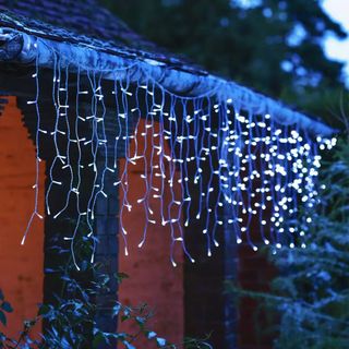 String lights draped over shed