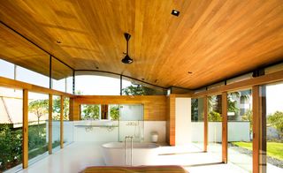 Two transparent wings create a flow of cool, natural ventilation, light and unimpeded views, especially from the master bedroom