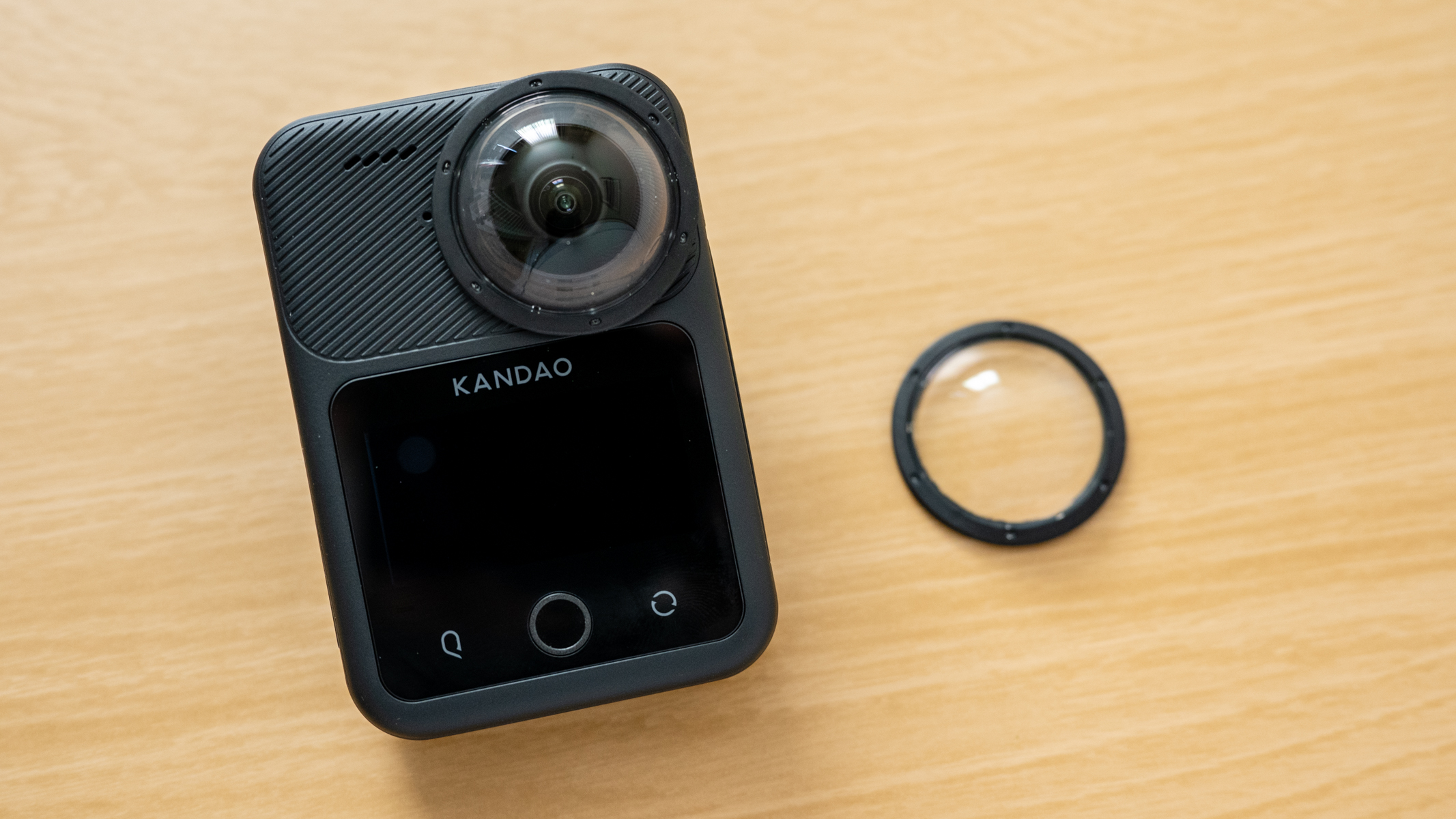 Kandao QooCam 3 Ultra with lens protectors on a table