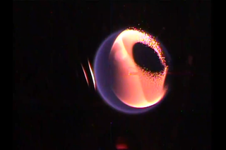 A screenshot of the Structure and Response of Spherical Diffusion Flames (s-Flame) experiment in action.