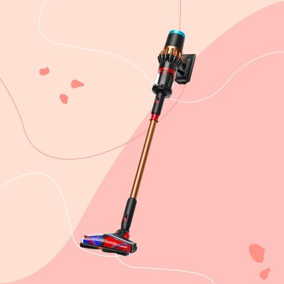 Dyson V16 Piston Animal vacuum on a pink background