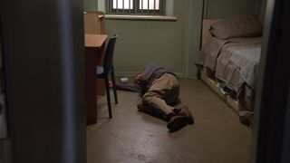 A prison officer discovers Roy Cropper on the floor.