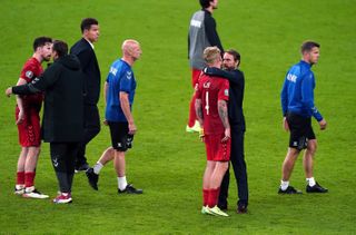 Gareth Southgate consoles Denmark’s Simon Kjaer after the semi-final