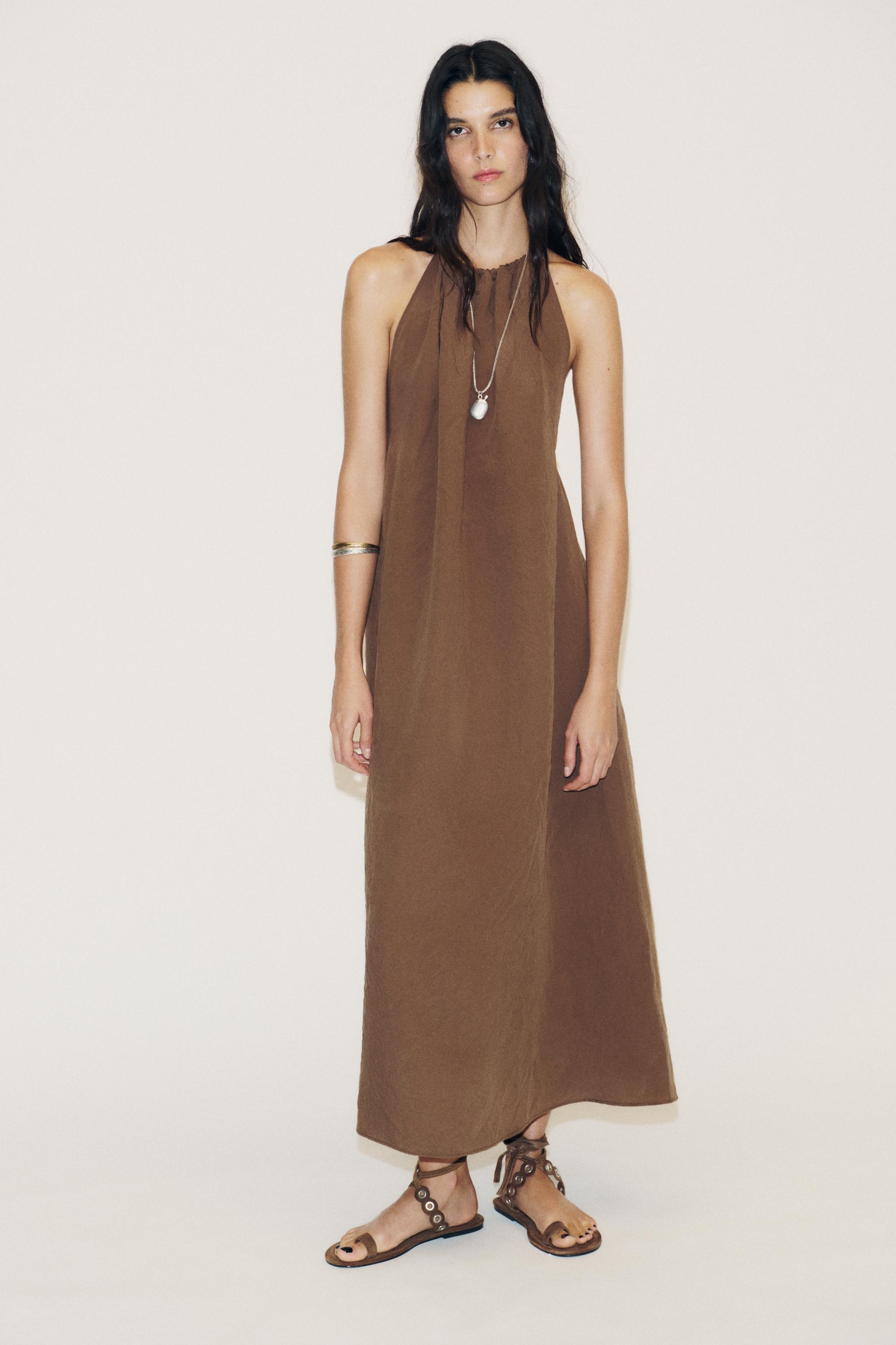 Flowing Open Back Halterneck Dress