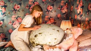 The 12-year-old Tinja, a giant egg and a teddy bear whose stuffing is all pulled out