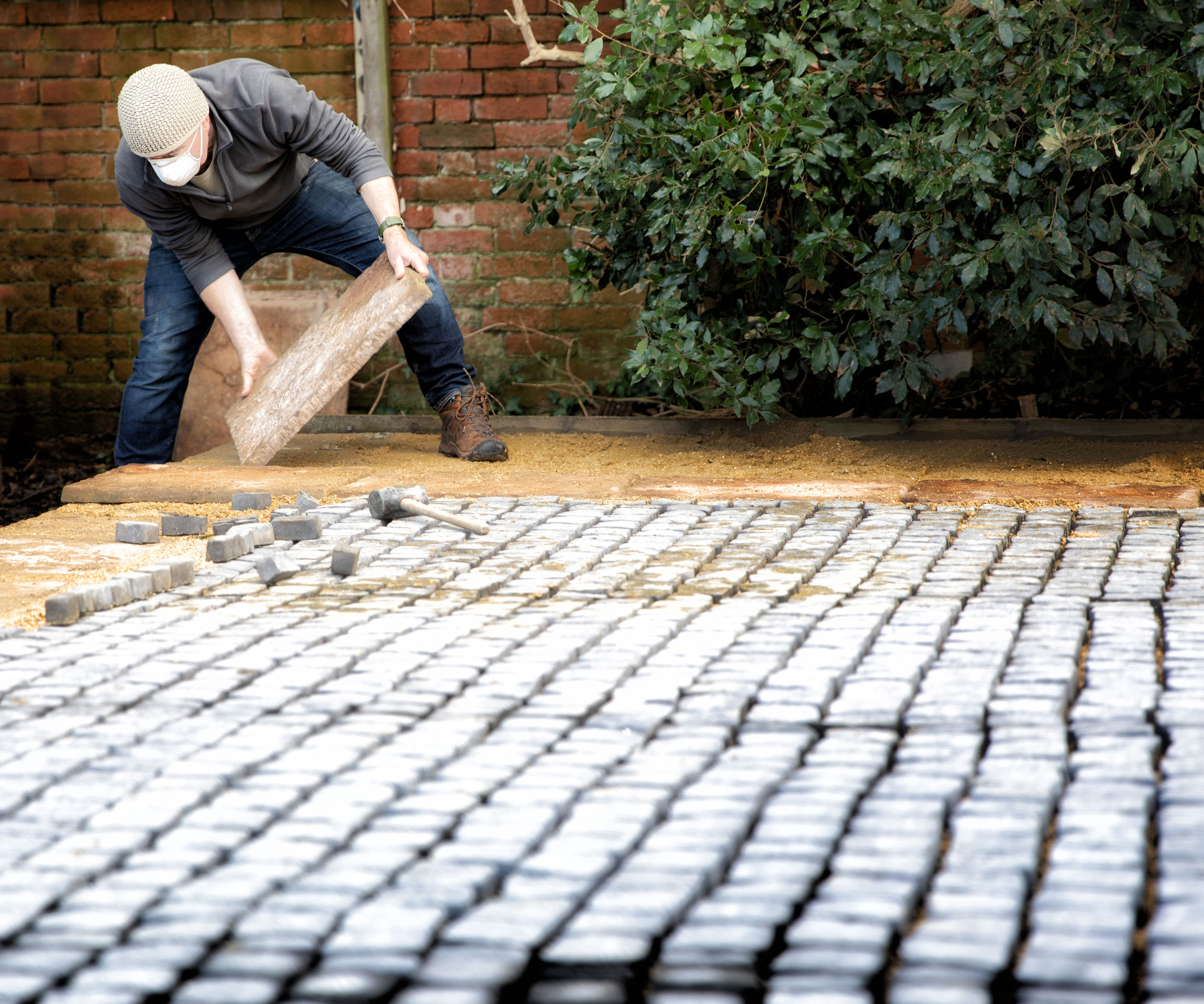patio sub base in garden being constructed by builder