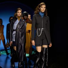 models on the fall 2026 hermes runway wearing thigh high boots