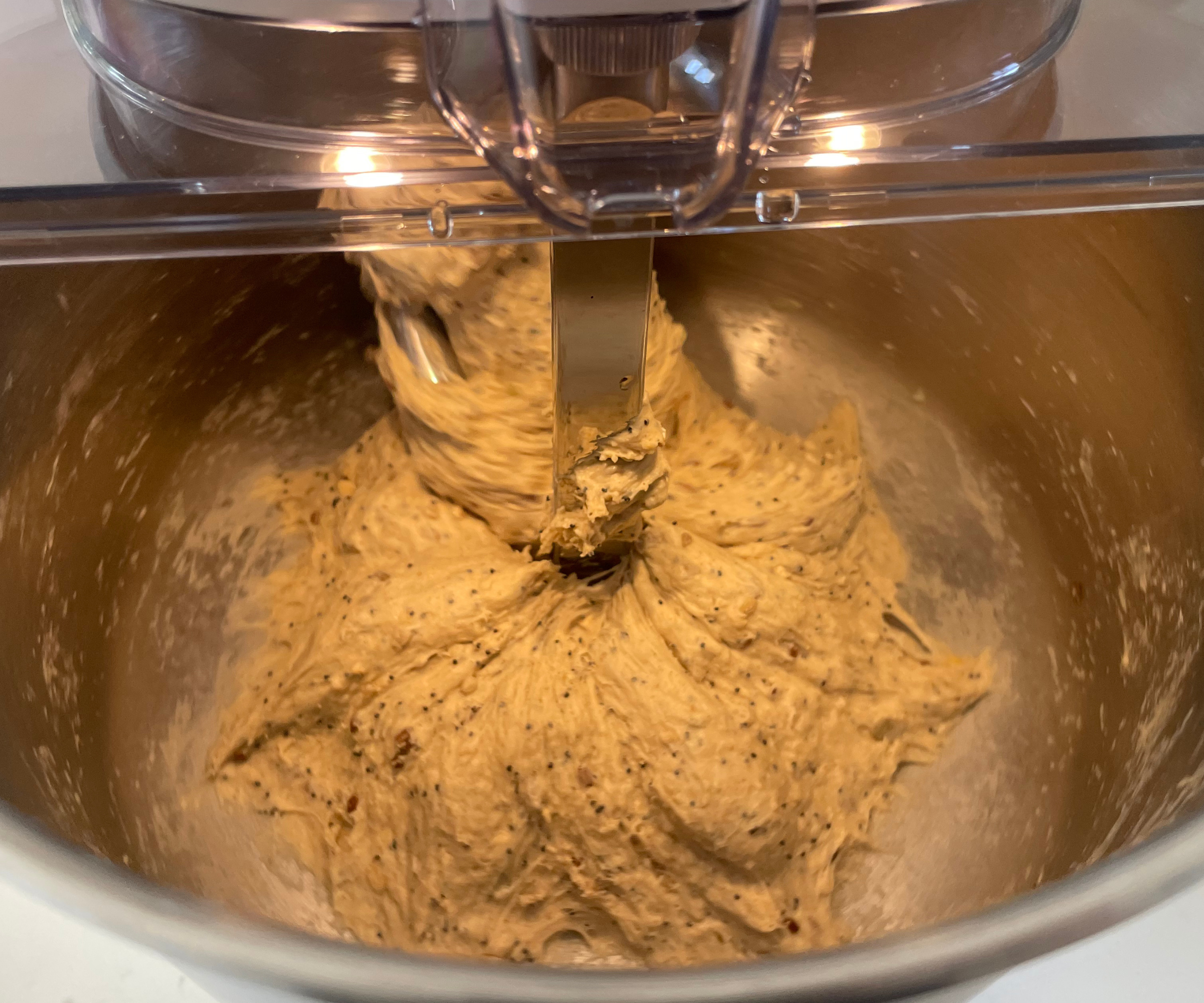 An elastic seeded bread dough forming in the Ooni Halo Pro Spiral Mixer