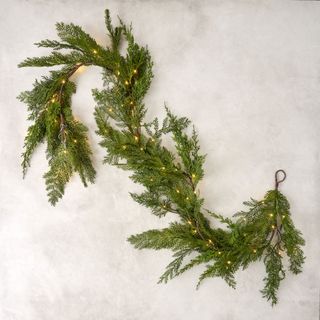 Real Touch Cedar Mix Pre-Lit Garland against a white background.