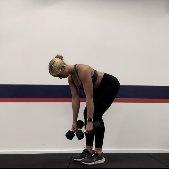 Personal trainer Klaudia Lucia demonstrating a bent-over row