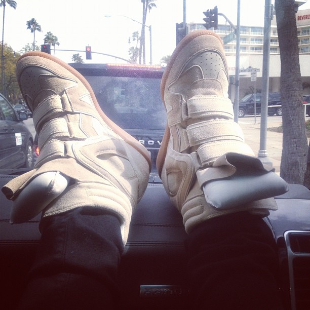 Kim Kardashian wears the Isabel Marant wedge trainers in 2012, as posted on her Instagram account with the caption &quot;On my Isabel Marant swag today&quot;.
