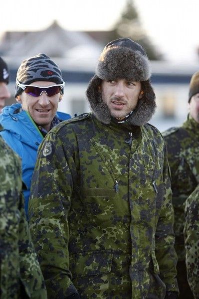 Fabian Cancellara keeps warm.