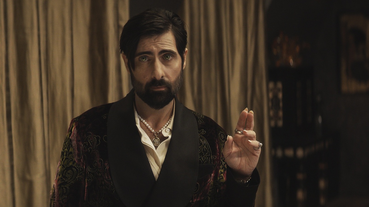 The rakish vampire Burton (Jason Schwartzman) with gleaming brown eyes stands solemnly in his Upper West Side penthouse in AMC's "Talamasca: The Secret Order".