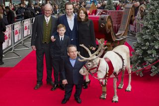 Kit Connor at 10 with the cast at the premiere of Get Santa.
