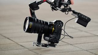 Nikon's Nikkor Z 28-135mm F/4 PZ cine lens attached to a Nikon Z9 and mounted to a RS4 Pro gimbal