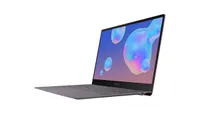 Samsung Galaxy Book S lightweight laptop shown with screen open. On the screen is a screensaver showing bubbles that are predominantly blue and of difference sizes. The laptop's screen is orientated at 92.4 degrees.