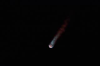 A SpaceX Falcon 9 rocket carrying a Dragon cargo ship for NASA soars into the predawn sky after launching from Space Complex 40 at Cape Canveral Air Force Station in Florida on May 4, 2019.
