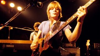 Tina Weymouth and Jerry Harrison (behind) from Talking Heads perform live on stage in New York in 1977