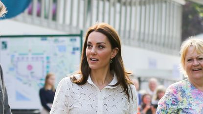 Kate Middleton's white lace blouse and skinny jeans in new Christmas photo delights fans