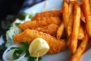 Fish and chips on a plate.